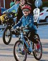 Pupils take to streets for 'biggest bike bus' Pupils take to streets for 'biggest bike bus'