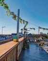 Hidden rooftop bar with sprawling views of city Hidden rooftop bar with sprawling views of city
