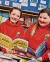 Donation helps school stock up on books Donation helps school stock up on books