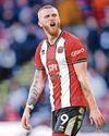 McBurnie nears signing decision31