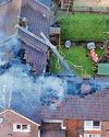 Man with baby escapes flat fire through window Man with baby escapes flat fire through window6
