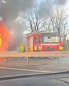 DRAMATIC MOMENT BUS BLAZES ON THE A55 DRAMATIC MOMENT BUS BLAZES ON THE A550