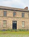 Homes plan for 200-yr-old inn built for the A523
