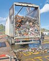 Fire smoke lingers as load remains on lorry Fire smoke lingers as load remains on lorry0