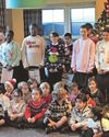 Children bring festive cheer to care home0