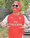 Gunners fan keeps promise to shave off his ten-year-old beard after title win Gunners fan keeps promise to shave off his ten-year-old beard after title win3