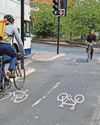 Transport trial Bike lanes could be painted red to reduce conflict Transport trial Bike lanes could be painted red to reduce conflict6