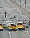 Seven police officers hurt in pursuit pile-up Seven police officers hurt in pursuit pile-up