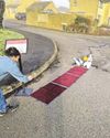 Pothole now a bowling alley in road protest Pothole now a bowling alley in road protest20