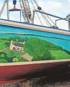Mural boat salvaged after mystery sinking0