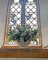 Knitting club joins with villagers to fill church with doves for VE Day17