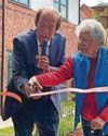 Founding resident cuts ribbon8
