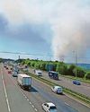 Roads closed as firefighters battle huge moor fire Roads closed as firefighters battle huge moor fire