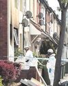 Woman held after two kids die in fire11