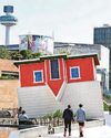 STRAIGHT UP! CITY'S UPSIDE DOWN HOUSE COULD BE STAYING PUT STRAIGHT UP! CITY'S UPSIDE DOWN HOUSE COULD BE STAYING PUT
