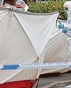Woman is charged with murder after flat stabbing