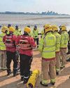 Beach rescue after mud traps women16