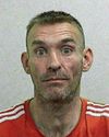 Robber waved axe in front of shop manager Robber waved axe in front of shop manager