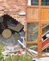 Two arrested after car ploughs into care home5
