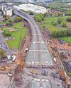 Workmen break through full width of doomed flyover0