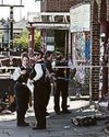 Arson bid at Jewish- links shop is probed0