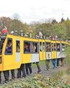 Metro train rolls up to play starring role in puppetry parade Metro train rolls up to play starring role in puppetry parade