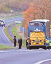 Pedestrian killed after being hit by bus on A11