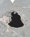 Sinkhole opens up on main road outside jail5
