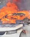 Taxi catches fire at traffic lights Taxi catches fire at traffic lights7
