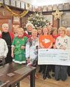 Golfers donate proceeds of charity drive0