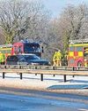 Road closure and delays after car rolls down embankment Road closure and delays after car rolls down embankment5