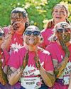 Runners get messy for charity fundraiser Runners get messy for charity fundraiser