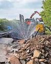 Sinkhole appears in village road after water pipe bursts Sinkhole appears in village road after water pipe bursts