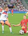 WALES SUFFER EXIT AS CHAMPS ROAR ON40