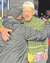 Epic achievement of the last Ironman across line Epic achievement of the last Ironman across line1