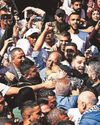 Living hostages and Palestinian prisoners freed amid ceasefire Western Mail