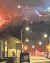 Homes evacuated amid mountain fire8
