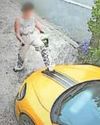 Woman caught on security camera kicking £75k car Woman caught on security camera kicking £75k car9