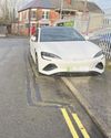 'They must be having a laugh!' Locals baffled as lines painted around car1