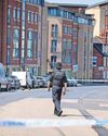 Armed officers headed back to police HQ while killer was on the loose7