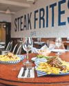 Cafe offering unlimited steak and fries for #20 Cafe offering unlimited steak and fries for #200