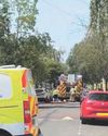 Road closes as crews tackle fire in four roof spaces in city5