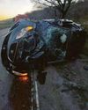 Two men injured as car flips onto roof Two men injured as car flips onto roof