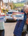Neighbours celebrate win together as they scoop £100k each on lottery Neighbours celebrate win together as they scoop £100k each on lottery