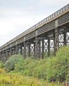 Wooden bridge could sit in shadow of the ‘iron giant' to improve access Wooden bridge could sit in shadow of the ‘iron giant' to improve access