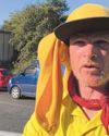 'Yellow Caravan Man' makes the move to yet another major city traffic island 'Yellow Caravan Man' makes the move to yet another major city traffic island9