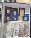 Thousands in gold and silver found in city raids Thousands in gold and silver found in city raids1