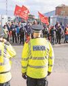 Police urged to get tough and stop bin strike pickets 'holding city to ransom' Police urged to get tough and stop bin strike pickets 'holding city to ransom'3