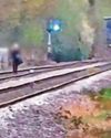 Man puts life in danger walking along rail line as steam train due Man puts life in danger walking along rail line as steam train due