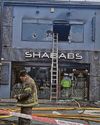 Hero grabs ladder to rescue man in restaurant blaze Hero grabs ladder to rescue man in restaurant blaze12
